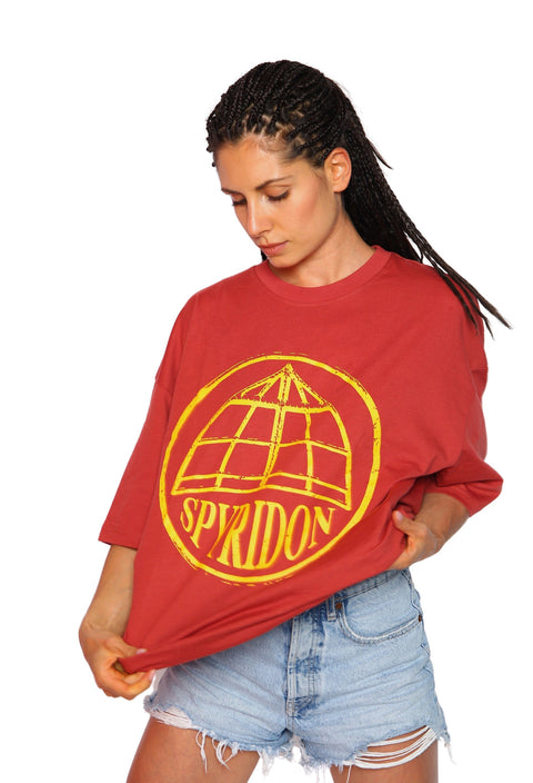 The oversized red t-shirt bears the symbol of St. Spyridon's hat